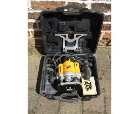 Cased JCB router with tools