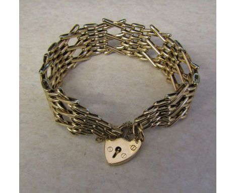 9ct gold gate bracelet and locket weight 24.3 g