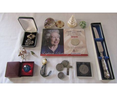 Selection of coins inc Queen Elizabeth 80th birthday crown, Swarovski, silver handled bread knife, shells, Heuer ladies watch