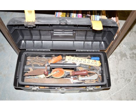 A plastic toolbox; containing a quantity of tools.