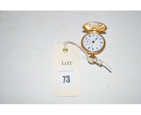 An 18ct. gold cased hunter fob watch, the outer case decorated with floral scrolls, white enamel roman dial with subsidiary s