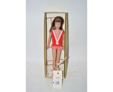 'A 'Skipper' doll, by Mattel, in original box.