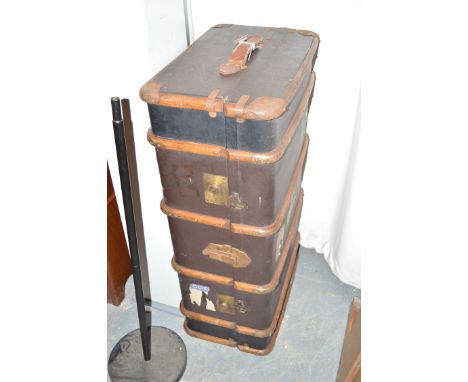 An old trunk with wooden with metal bindings.