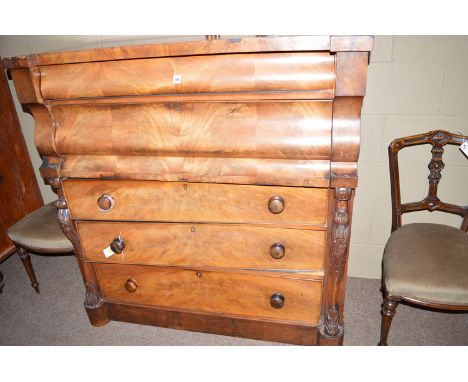 A 19th Century mahogany Scotch chest of five drawers, raised on a plinth base, 48in. wide.