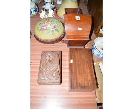 A 19th Century doll's mahogany cradle; a mahogany trinket box; an Eastern carved box; together with a Victorian footstool.