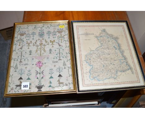 A 19th Century needlework sampler; and a hand-coloured map of Northumberland, after J. Cary.  (2)