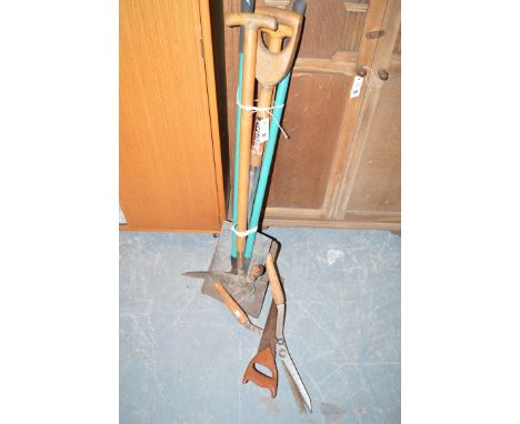 Two bundles of garden tools.
