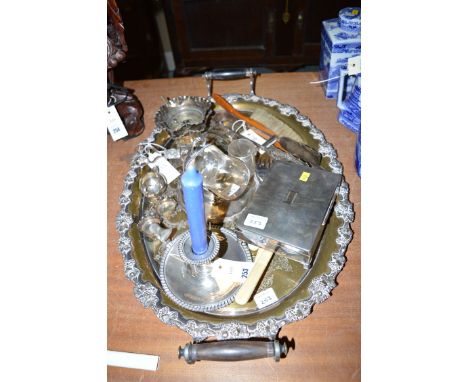 A oval silver plated two handled tray; a chamber candlestick; candle snuffers; and other silver plated ware.