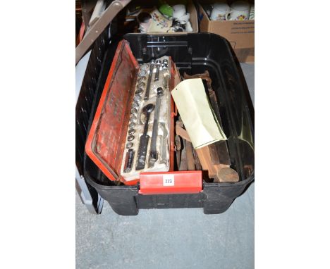 A box of assorted tools; and a socket set.