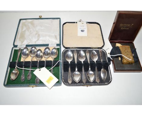 A set of six silver teaspoons, by RSM, Sheffield, in fitted box; together with another set with shaped handles, by Henry Wilk