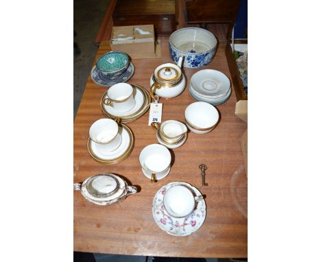 A Delft blue and white bowl, with windmill decoration; Cauldon's china tea ware; another enamel decorated plate and bowl; a b