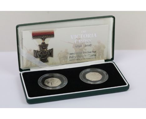A Royal Mint United Kingdom Queen Elizabeth II silver proof 2006 Victoria Cross 50p two coin set, encapsulated within fitted 