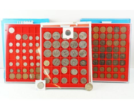 A collection of mainly British pre decimal and commemorative coins contained within three Lindner display cases to include si