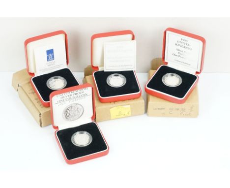 A collection of four Royal Mint Queen Elizabeth II £1 silver proof coins to include 1983, 1999, 1995 and 1998 examples, all e