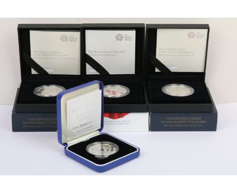 A collection of four Royal Mint Queen Elizabeth II £5 silver proof coins to include 1998 and three 2017 examples, all encapsu