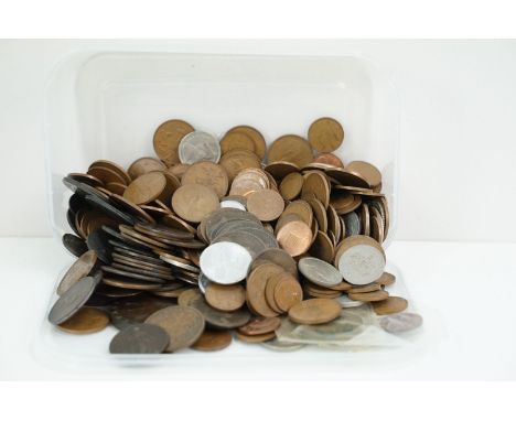 A collection of mainly British coins and tokens to include some silver examples and 18th / 19th century British tokens. 