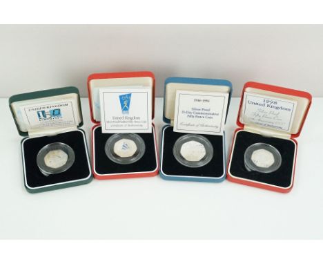 A collection of four Royal Mint Queen Elizabeth II 50p silver proof coins to include 2000, 1998, 1994 and 1998 examples, all 