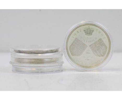 A collection of four silver proof £5 / Crown coins to include 1993 40th Anniversary of Queen Elizabeth II coronation, 1997 go