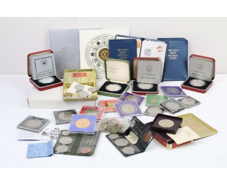 A collection of mainly uncirculated coins to include Kuwait silver examples, First decimal sets, crowns....etc.. together wit