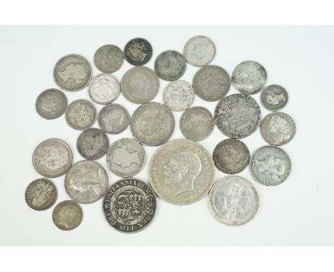 A small collection of silver coins, mainly British pre decimal to include King George III, Queen Victoria, Maundy money...etc