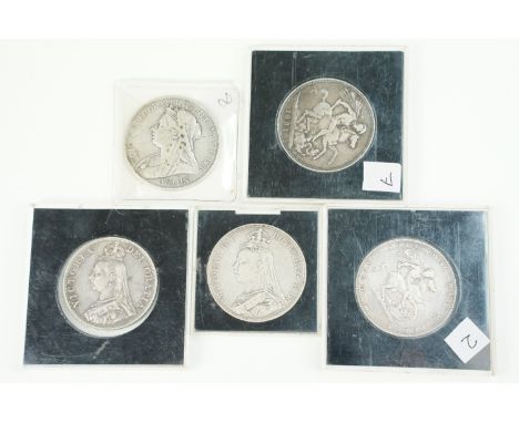 A collection of three British Queen Victoria silver crown coins to include 1889, 1900 and 1891 examples together with a QV do