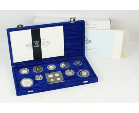 A Royal Mint UK Millenium Silver Collection coin set, comprising nine coins and four Maundy Coins, in a fitted blue case, wit