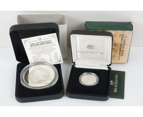 A Royal Australian Mint 1995 silver proof $1 coin together with a Perth Mint $2 Kookaburra silver proof coin, both encapsulat