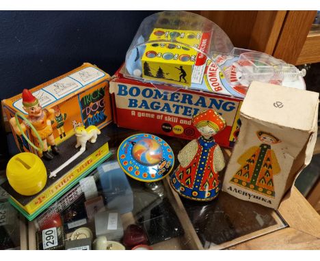 Boxed Boomerang Bagatelle Tin Plate Toy, Tricky Dog Bank, Russian Doll, and Spaceship Toy - some Eastern European