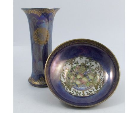 A Royal Worcester Crown Ware pedestal bowl, the centre decorated with a bowl of fruit, with a mottled blue lustre ground, sha