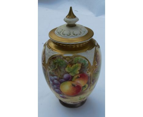 A Royal Worcester quarter lobed covered vase, decorated half round with fruit by Dare, shape number H169B, height 7.5ins Cond