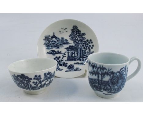 A First Period Worcester trio, comprising cup, tea bowl and saucer, all decorated in the European pattern, all with crescent 