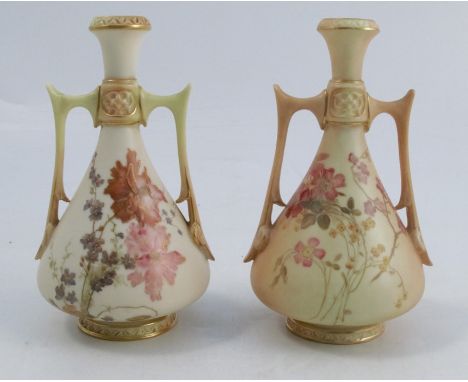 Two Royal Worcester blush ivory vases, with angular handle, decorated with floral sprays, shape number 1021, dated 1892 and 1
