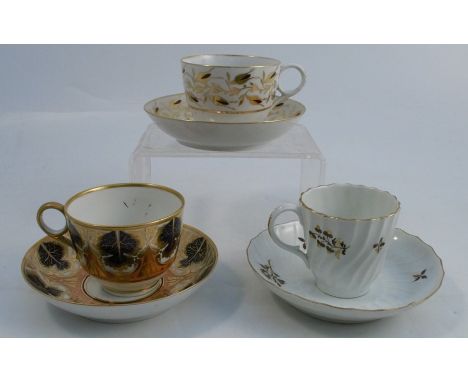 A Barr, Flight, Barr Worcester cup and saucer, decorated in blue and gilt to a coral ground, together with two other late 18t