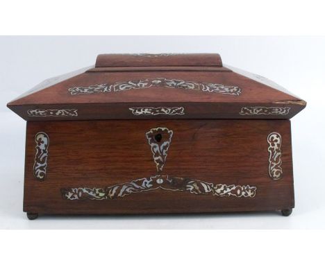 A 19th century rosewood sarcophagus shaped tea caddy, with mother of pearl inlay, the interior with central bowl flanked by t