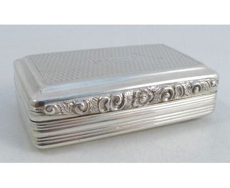 A Georgian silver table snuff box, of rectangular form with engine turned top and base, with ribbed sides, the top with engra