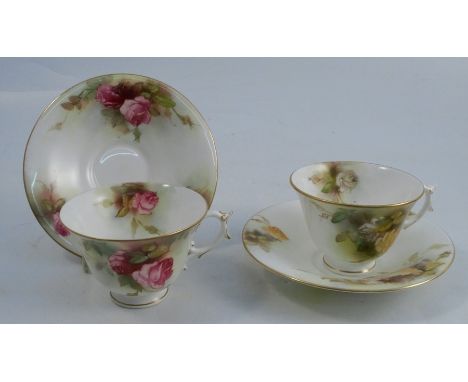 Two Royal Worcester cups and saucer, one decorated with yellow roses the other with pink roses, dated 1918 and 1919Condition 