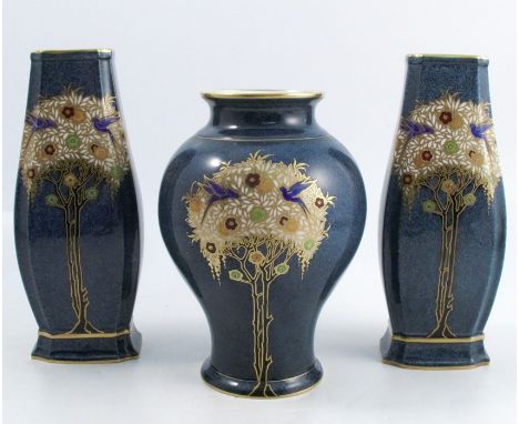 A garniture of Royal Worcester vases, to include a pair of rectangular baluster shaped vases and a baluster shaped vase, all 