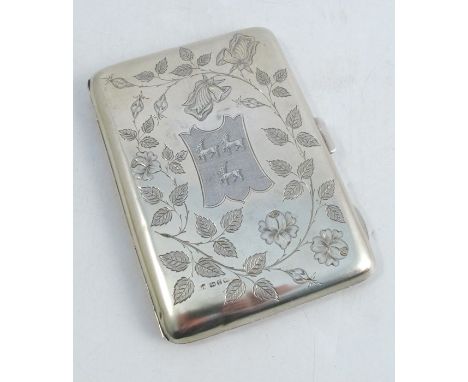 A silver aide memoire, of rectangular form, engraved with the coat of arms for Stansfield of Leeds to a flower and leaf frame