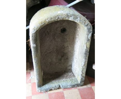 A garden pump trough, of curved rectangular form, width 19ins, depth 31ins, height 9ins