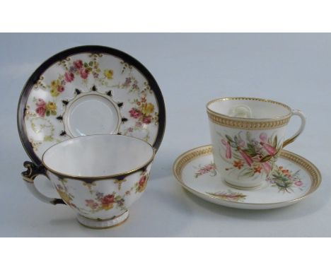 A 19th century Royal Worcester cup and saucer, decorated with flowers to a jewelled border, dated 1875, together another Roya