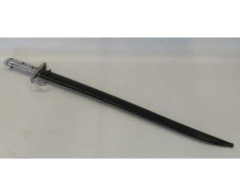 A bayonet, with silvered blade and handle, the blade dated 1871, with black scabbard