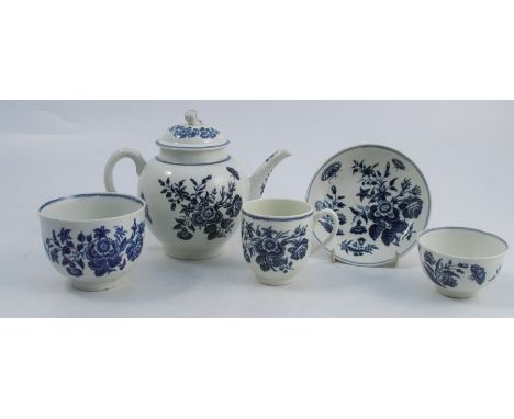 A First Period Worcester teapot, decorated in the Three Flowers pattern, cover af, crescent mark to base, together with a Fir