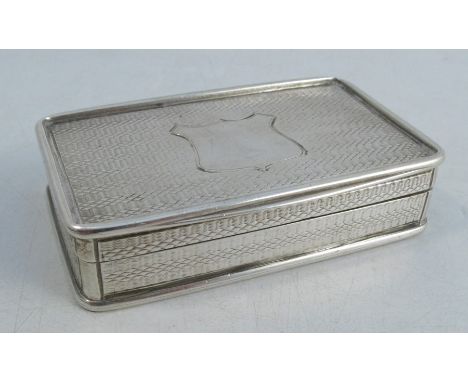 A William IV silver snuff box, of rectangular form, with engine turned decoration the top, sides and base, with vacant shield