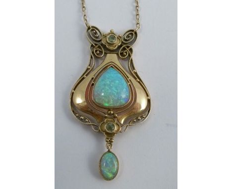 Murrle Bennett &amp; Co, an opal and peridot 15 carat gold Art Nouveau pendant, stamped MB&amp;Co monogram and '15ct' the alm