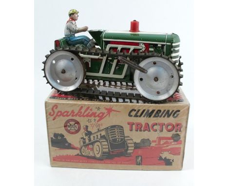 A MAR Toys Sparkling Climbing Tractor, the tin plate clockwork tractor with driver, boxed