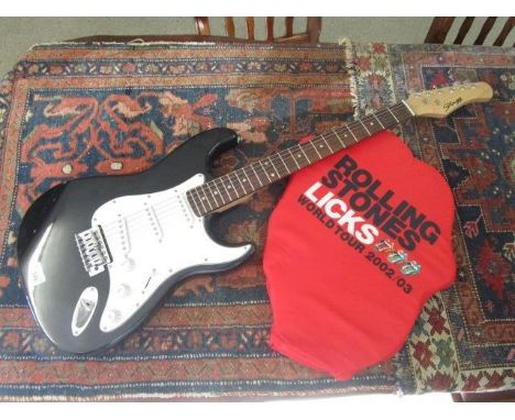 A Stagg electric guitar and Rolling Stones Licks World Tour 2002/3 concert memorabilia 