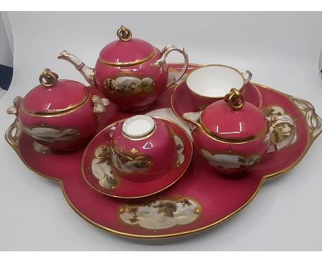 A fine quality 19th cent English Porcelain teaset for two ,consisiting of teapot ,coffee pot, sucrier with matching cups and 