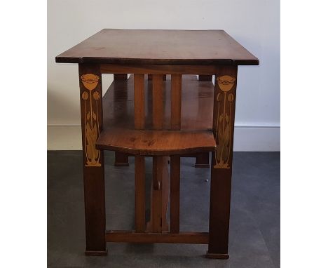 An art Nouveau Liberty table ,&nbsp; early 20th century, having rectangular top and four "tulip" marquetry inlaid supports un