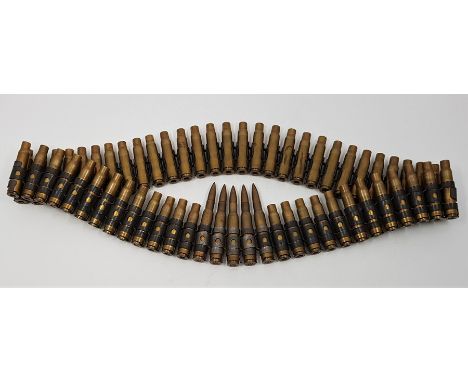 A gun belt of Kynoch 8mm cartridge cases.