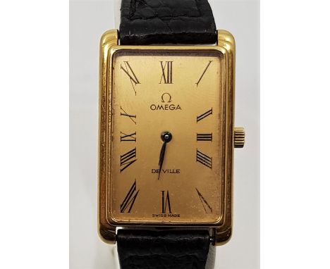 An 18ct. gold Omega De Ville wrist watch, manual movement, cal. 625, having signed rectangular Roman numeral gold dial, Omega